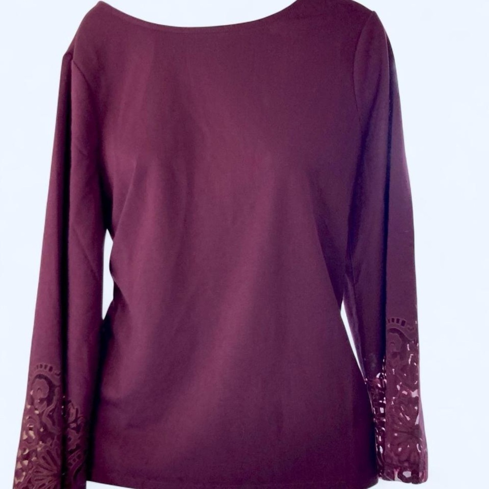 Chico's burgundy long sleeve top with lace detail. Size: 0